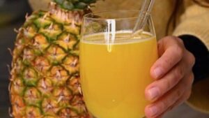 Pineapple juice in a glass cup