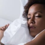 A black woman sleeping