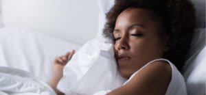 A black woman sleeping
