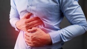 A man clutching his stomach
